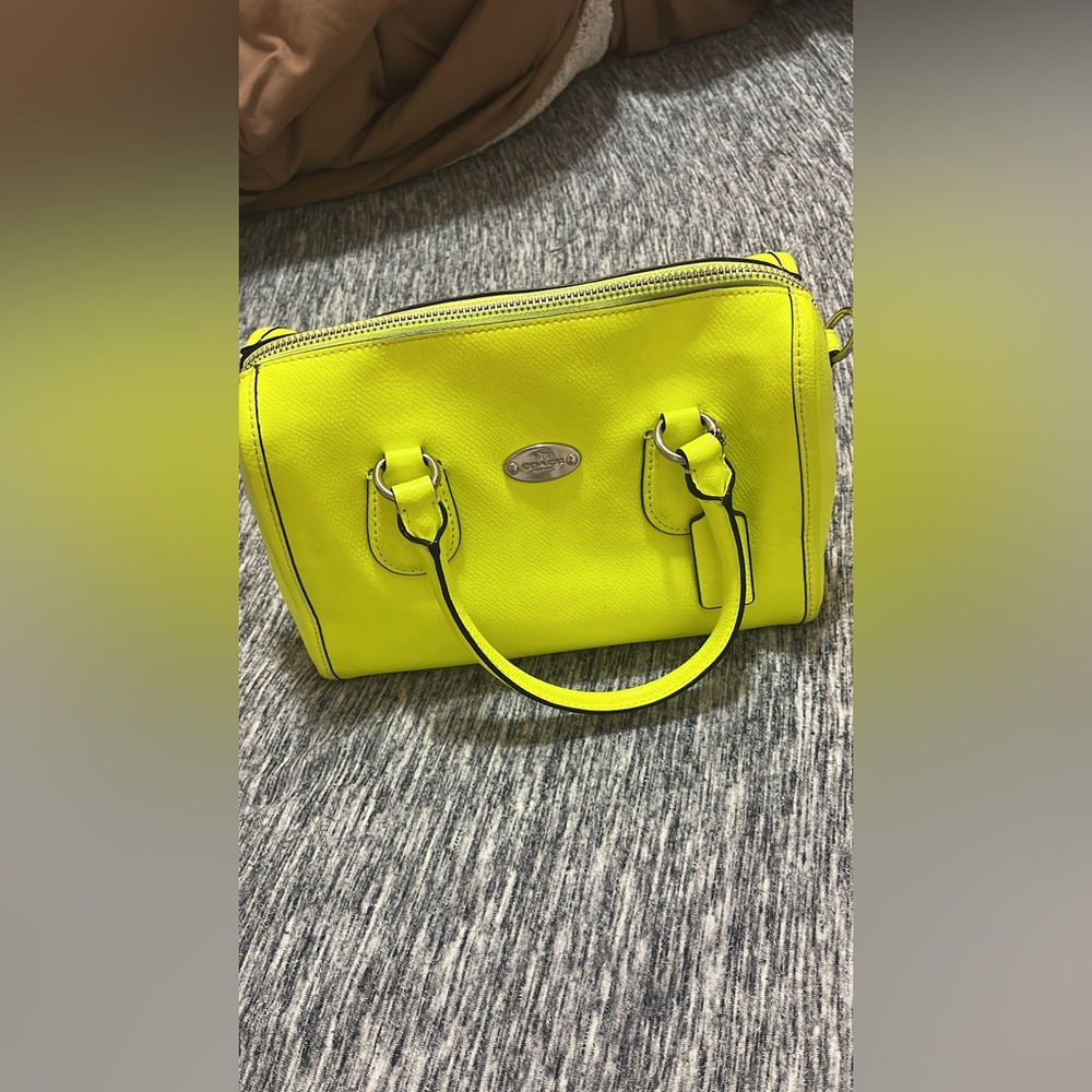 It’s a smaller handbag in neon yellow